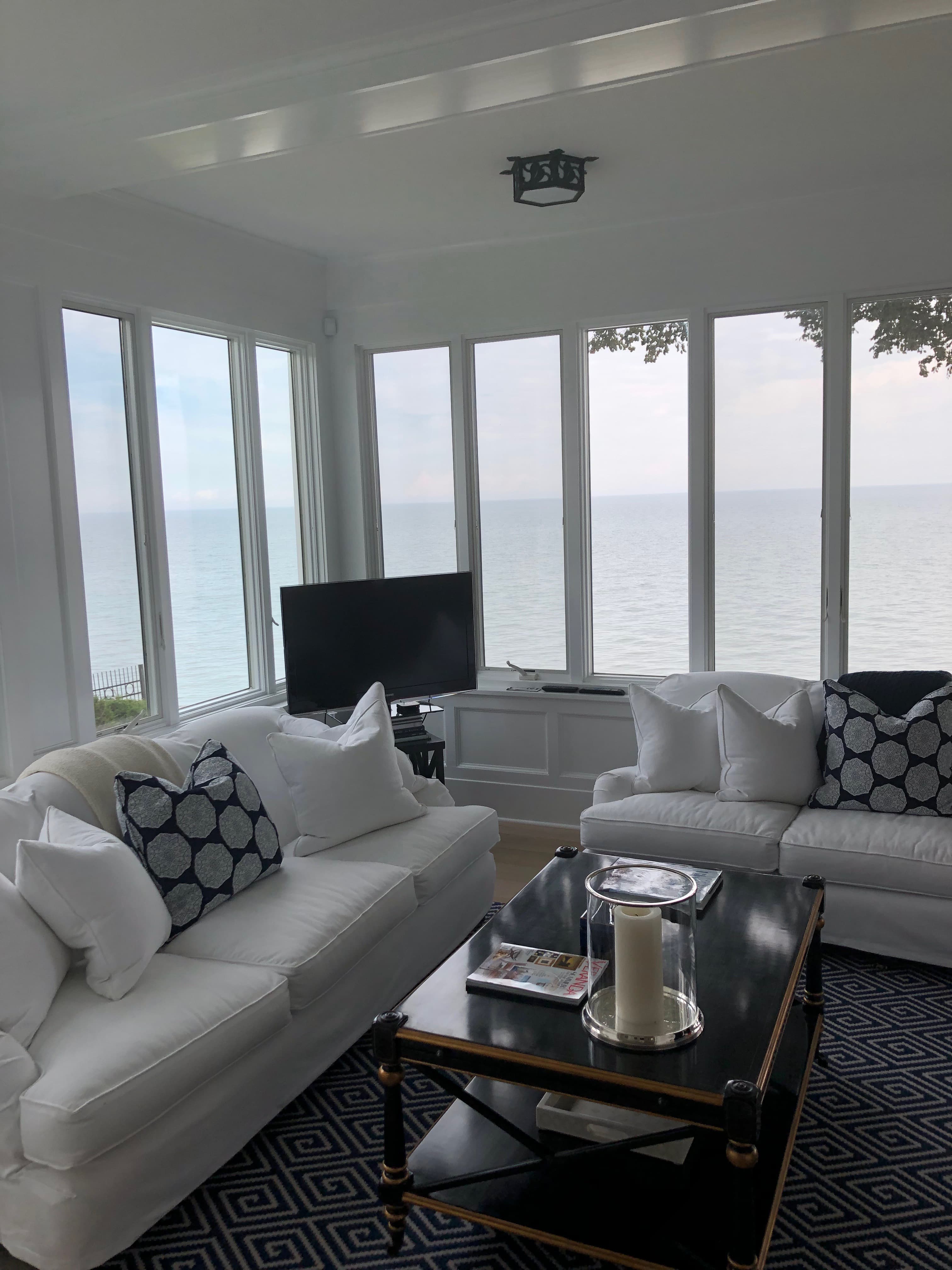 Custom slipcover work by Slipskins Studio.